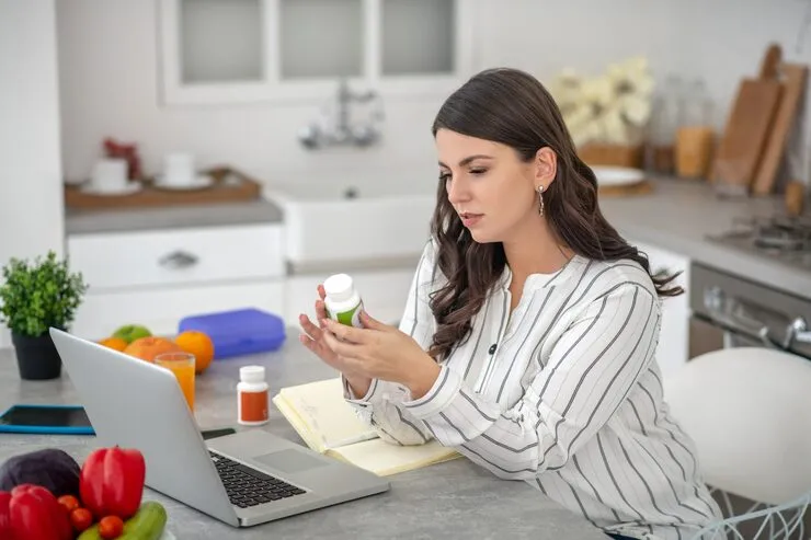 woman-striped-blouse-looking-int woman health and herbal